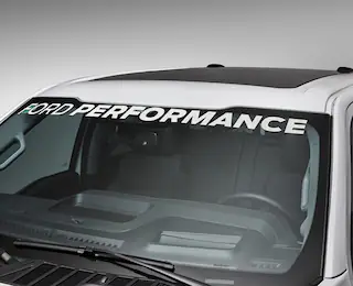 Closeup of windshield with a Ford Performance sticker on it
