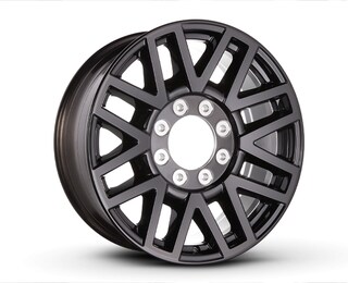 Closeup of a Ford Super Duty® Black Painted Aluminum Wheel