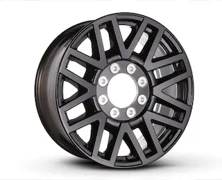 Closeup of a Ford Super Duty® Black Painted Aluminum Wheel