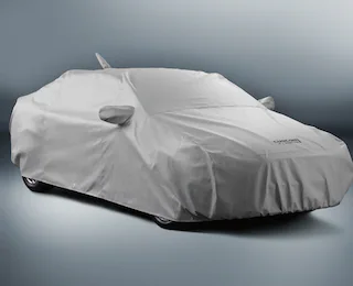A 2025 Fusion® wrapped in a car cover