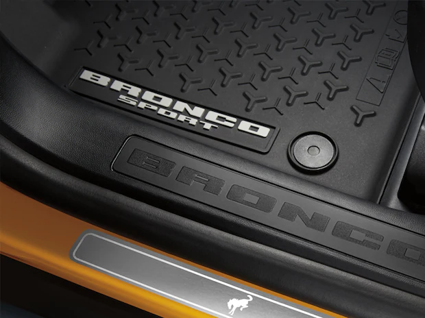 Close-up of a black all-weather 2026 Ford Bronco Sport® rubber floor mat inside a vehicle