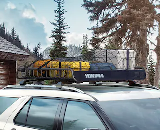 Closeup of a Yakima roof rack with items stowed on it