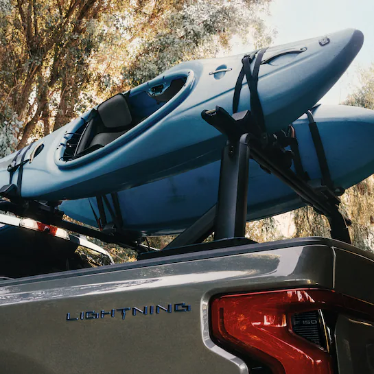 Closeup of kayaks on a Ford® Lightning® kayak bed mount