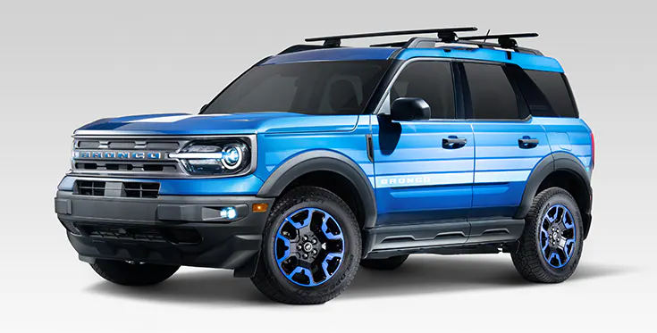 Parked Ford Bronco® Sport with Blue Free Wheeling™ vehicle upfit