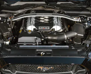 Close-up of a Mustang® engine compartment showing engine
