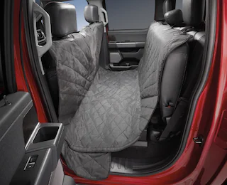 Closeup of a Ford Super Duty® rear seating covered by pet floor hammock